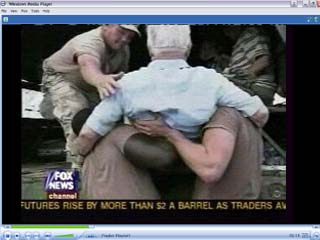 Click image to watch 1.9 mb .wmv video of troops saving lives